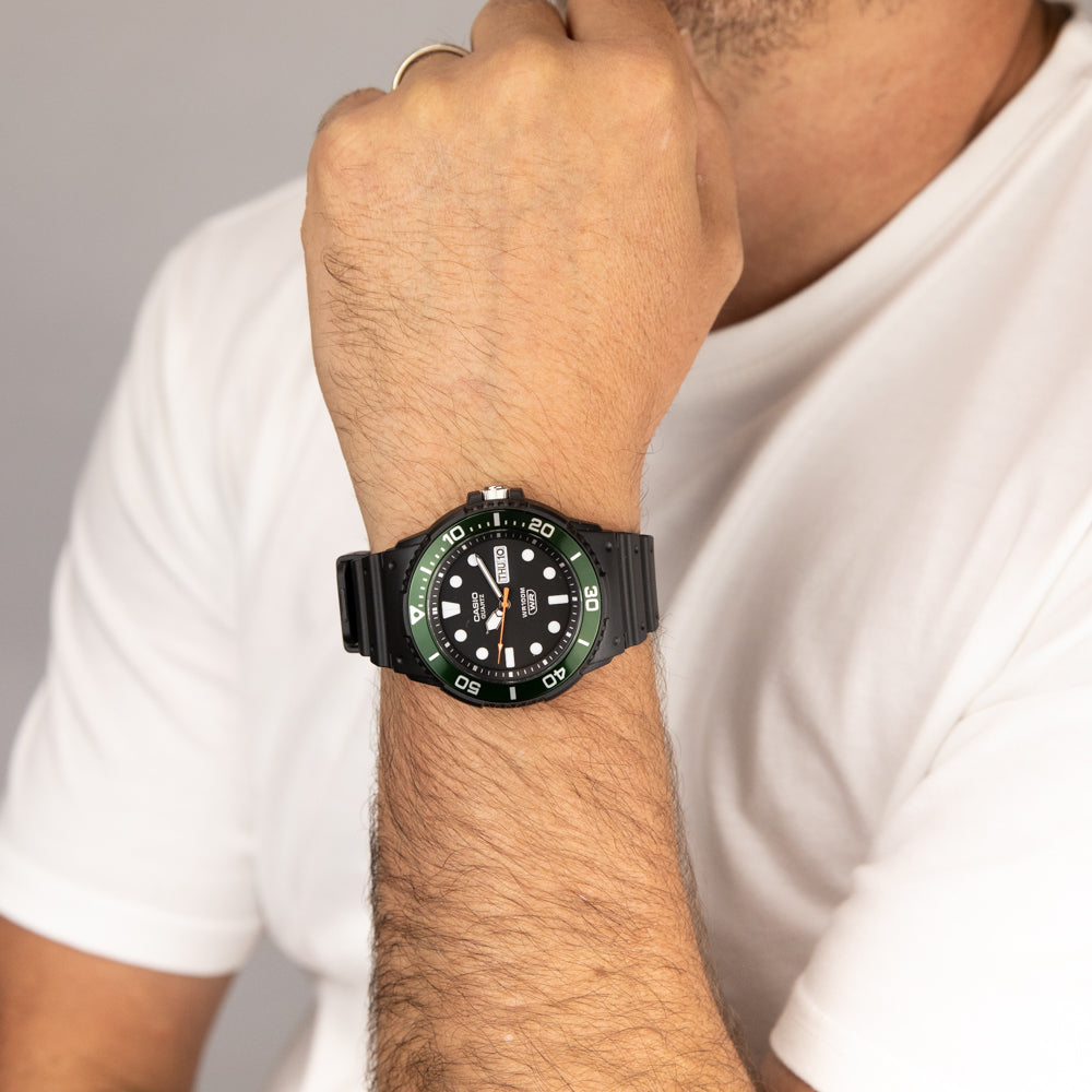 Casio MRW230H-1E3: Stylish Analog Watch with Bold Green Bezel