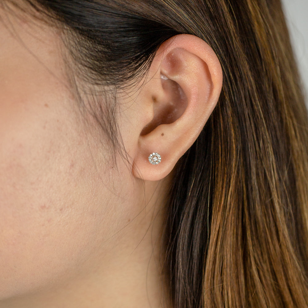 Stylish 9ct Rose Gold Stud Earrings Embellished with 15-Point Diamonds