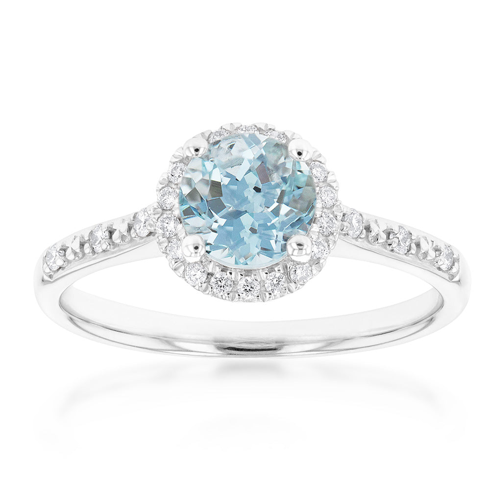 Stunning 9ct White Gold Ring with 0.75ct Aquamarine and 1/10 Carat Diamond Halo