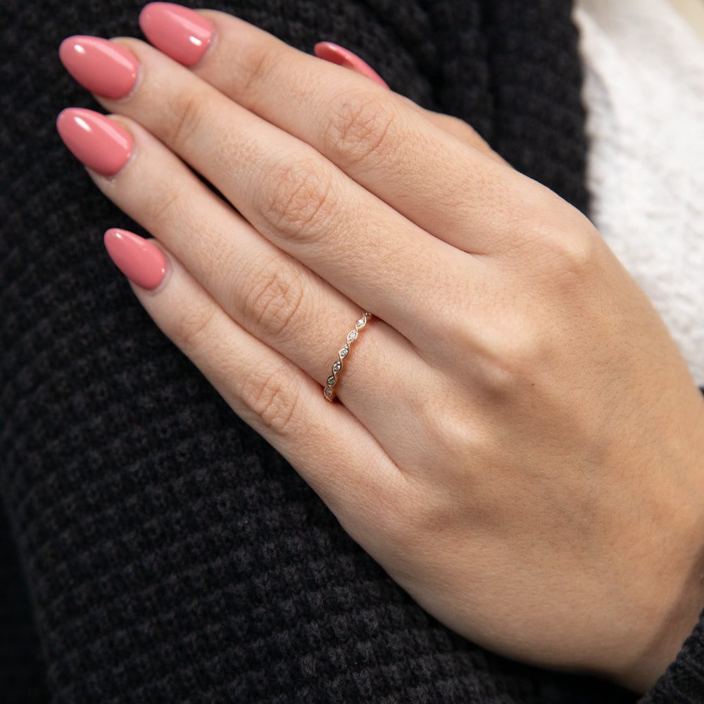 Stylish 9ct Rose Gold Ring Adorned with 9 Sparkling Diamonds