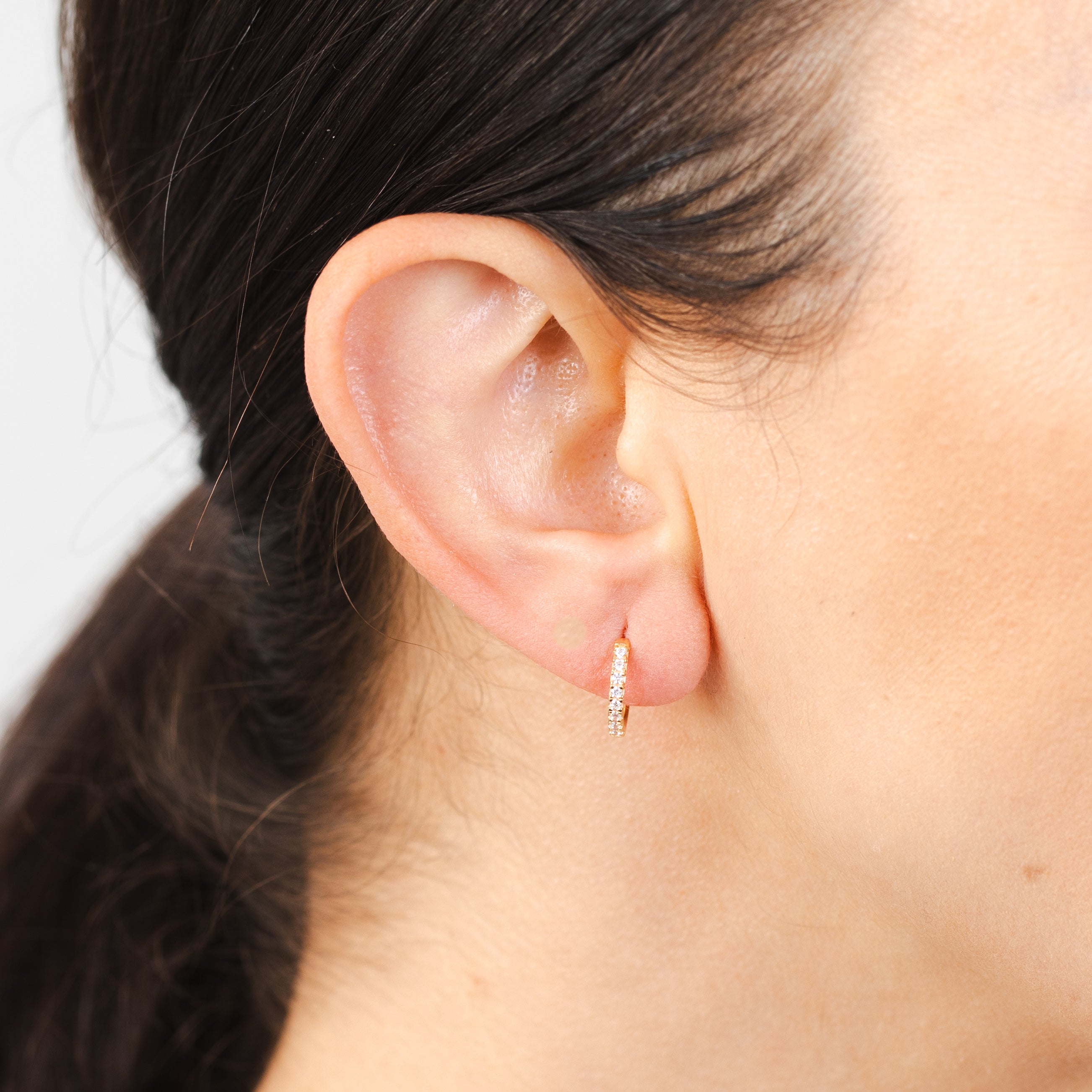 Stylish 9 Carat Yellow Gold Hoop Earrings Adorned with White Zirconia Gemstones