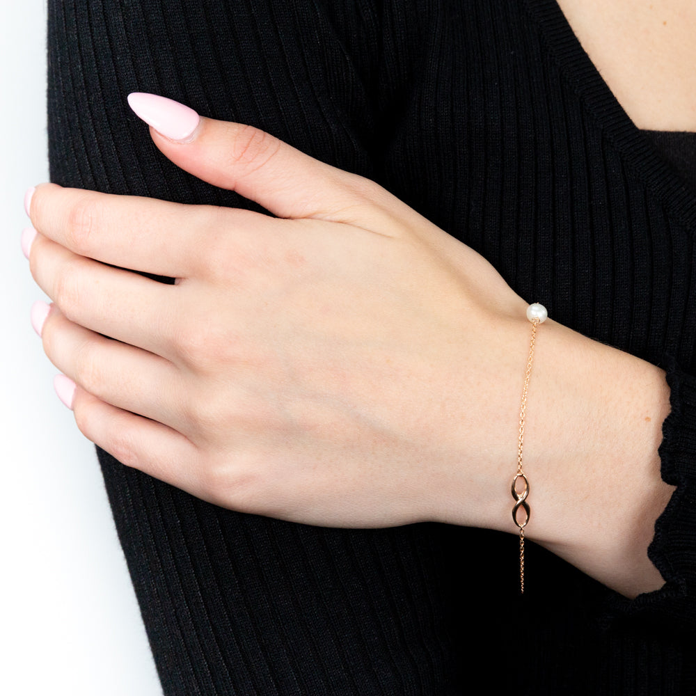 19cm 9ct Rose Gold Bracelet with Hand - selected Freshwater Pearl and Infinity Design