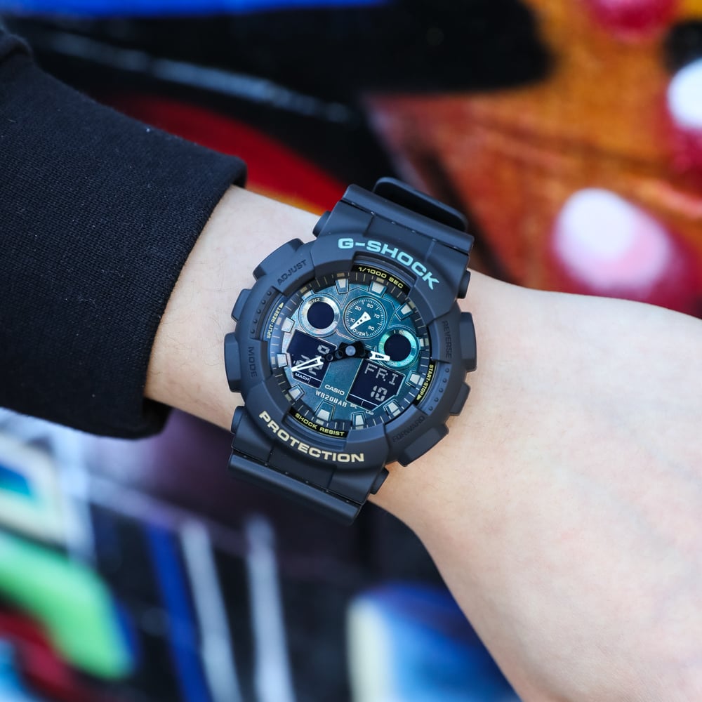 G-Shock GA100RC-1 Men's Wristwatch with Stylish Black and Rust Design