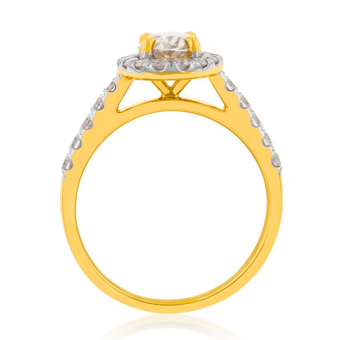 Exquisite 18 Carat Yellow Gold Ring Adorned with a 1.50 Carat Diamond Ensemble Featuring a 1 Carat Oval-Shaped Australian Diamond