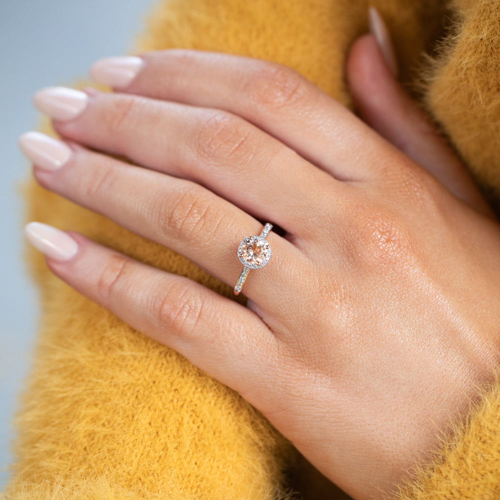 Exquisite 9 Carat Rose Gold Engagement Ring with 0.8 Carat Morganite and 0.10 Carat Diamond Halo