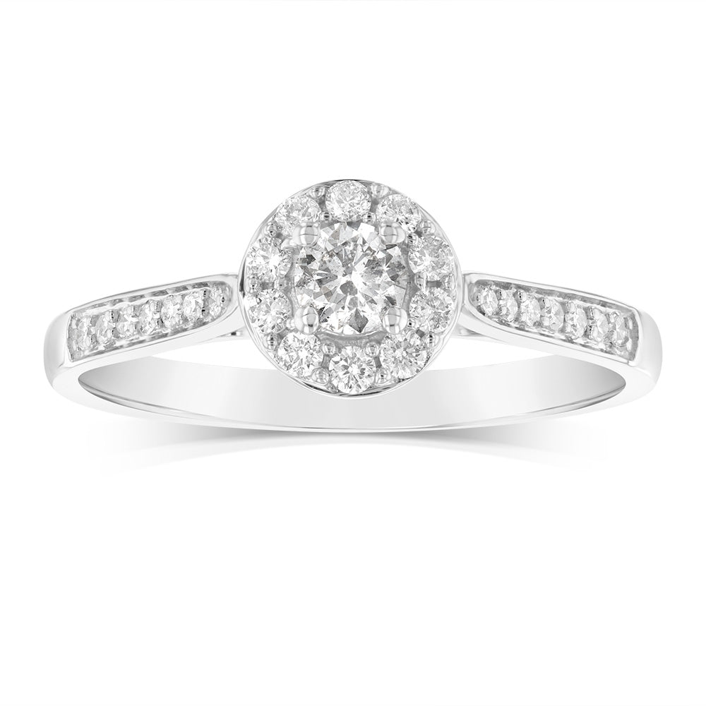 Exquisite 9 Carat White Gold Solitaire Ring with a 0.30 Carat Diamond Halo