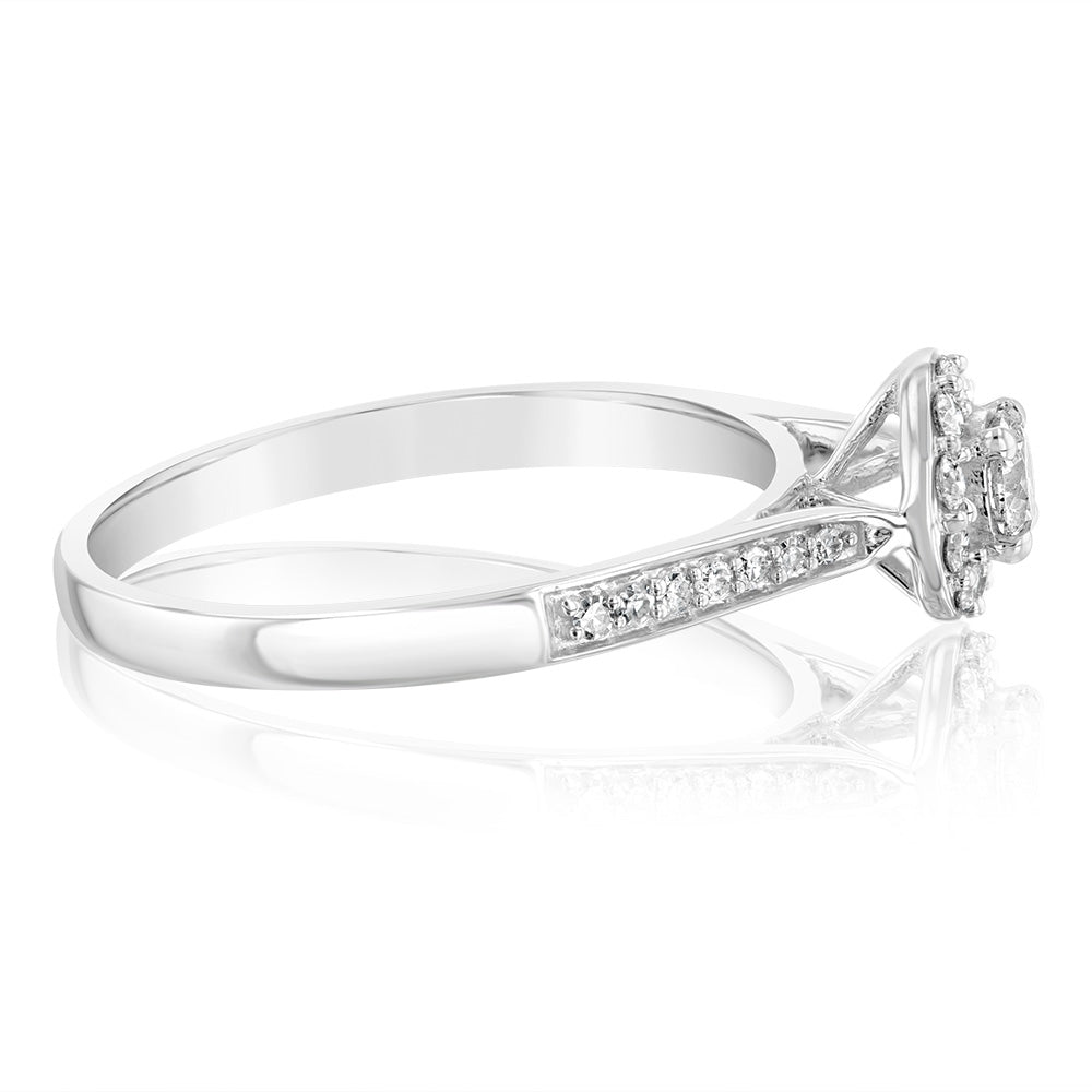 Exquisite 9 Carat White Gold Solitaire Ring with a 0.30 Carat Diamond Halo
