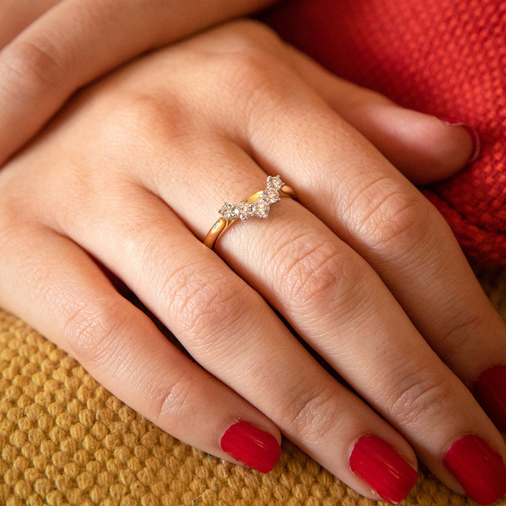 Exquisite 18-Carat Yellow and White Gold Engagement Ring Adorned with 0.5 Carats of Sparkling Brilliant Cut Diamonds