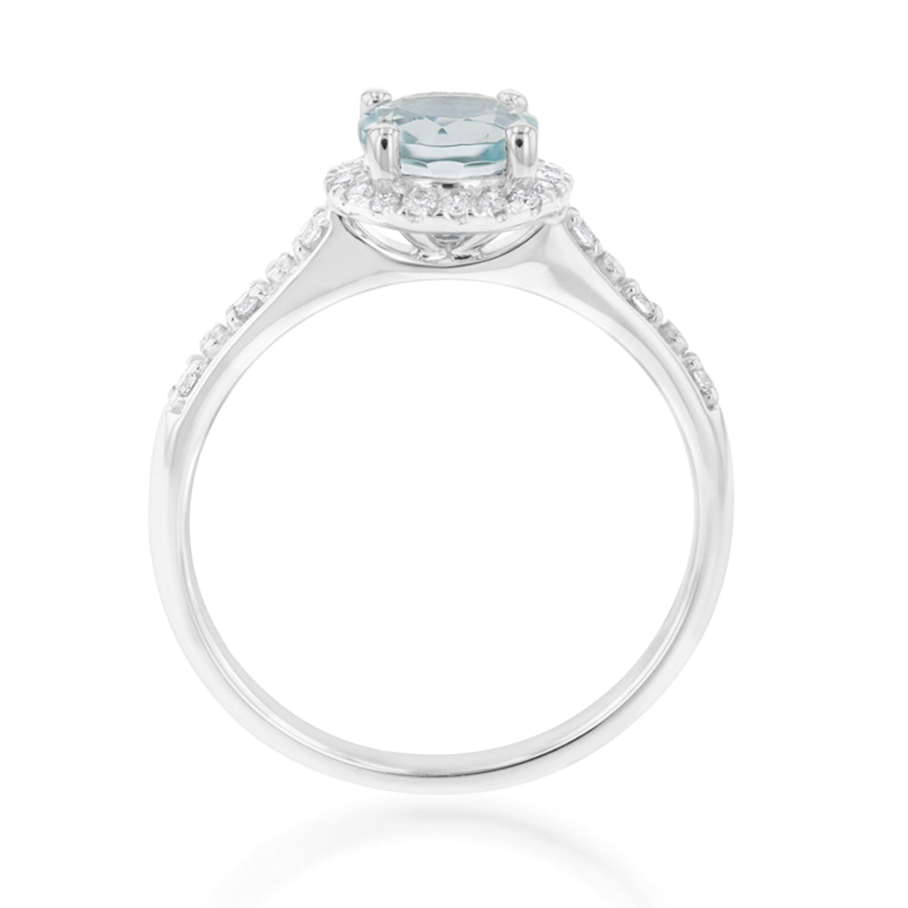 Stunning 9ct White Gold Ring with 0.75ct Aquamarine and 1/10 Carat Diamond Halo
