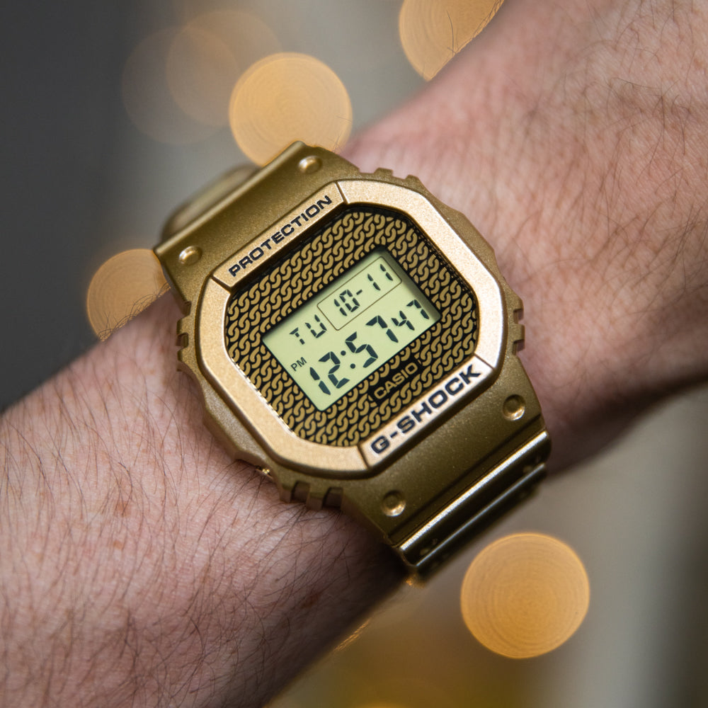 G-Shock DWE5600HG-1D Gold Chain Style Watch with Replaceable Cases