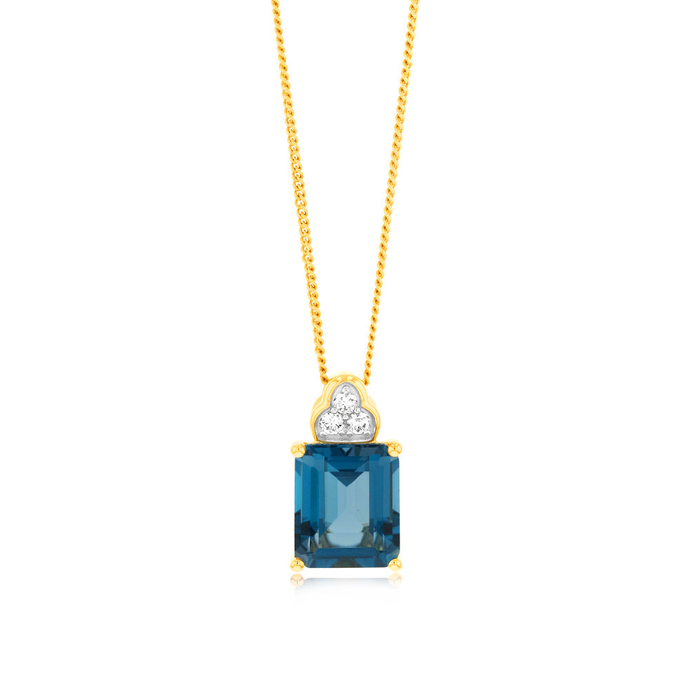Stunning 9ct Gold Pendant Featuring a 5.6ct Emerald Cut London Blue Topaz and a 1/10 Carat Diamond