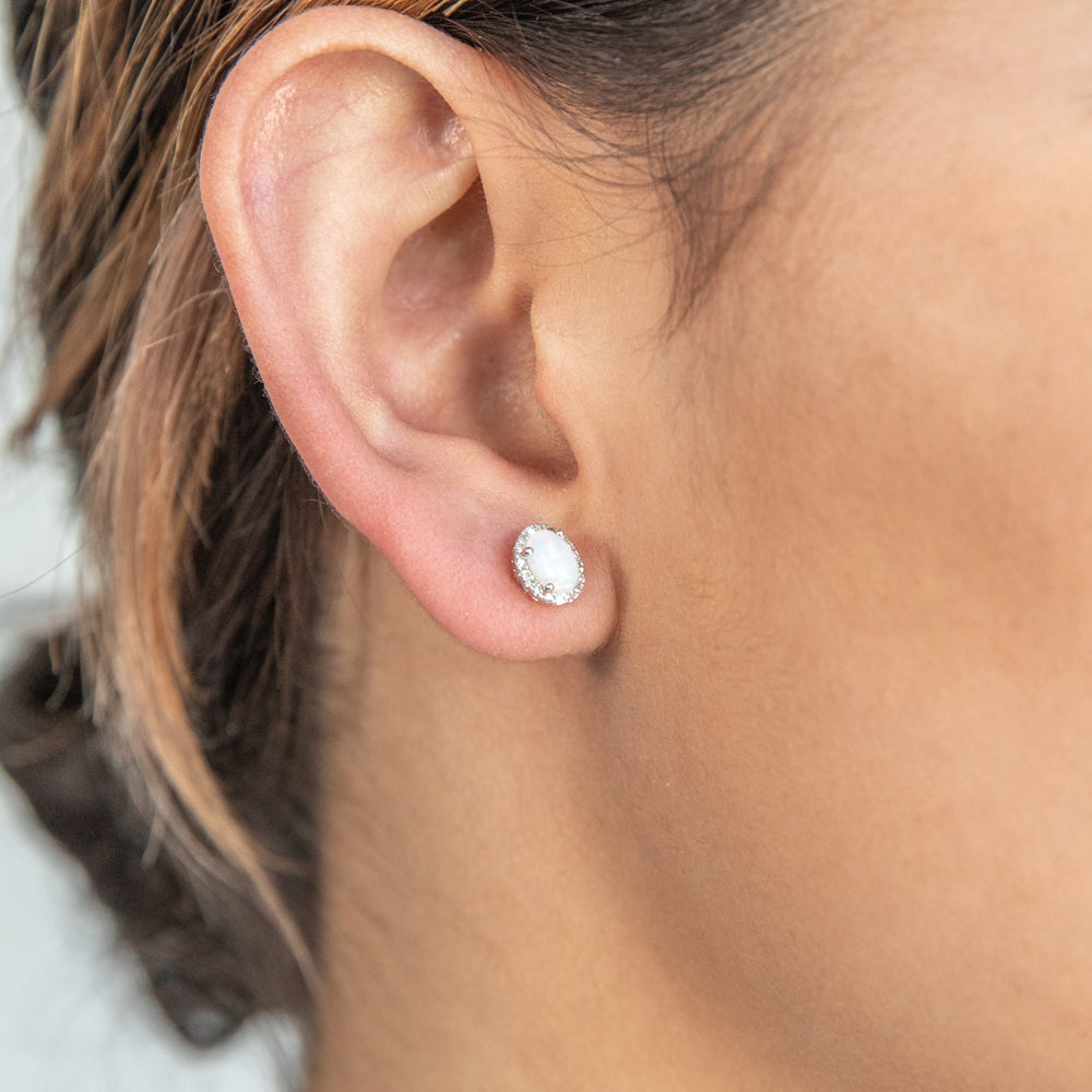Exquisite 9 Carat White Gold Stud Earrings with 0.25 Carat Natural White Opals and Sparkling Diamonds