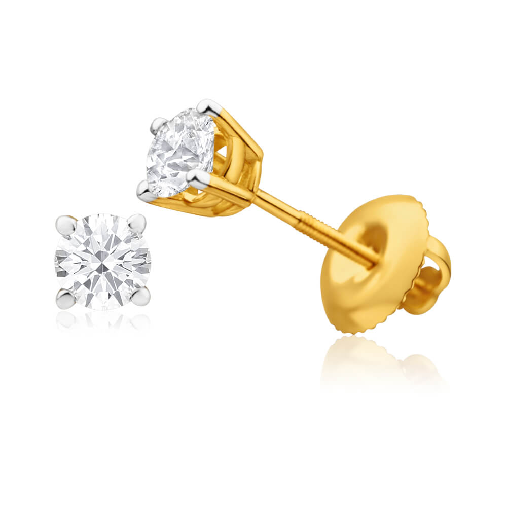 Exquisite 18 Carat Yellow Gold Stud Earrings Embellished with Half - Carat Diamonds