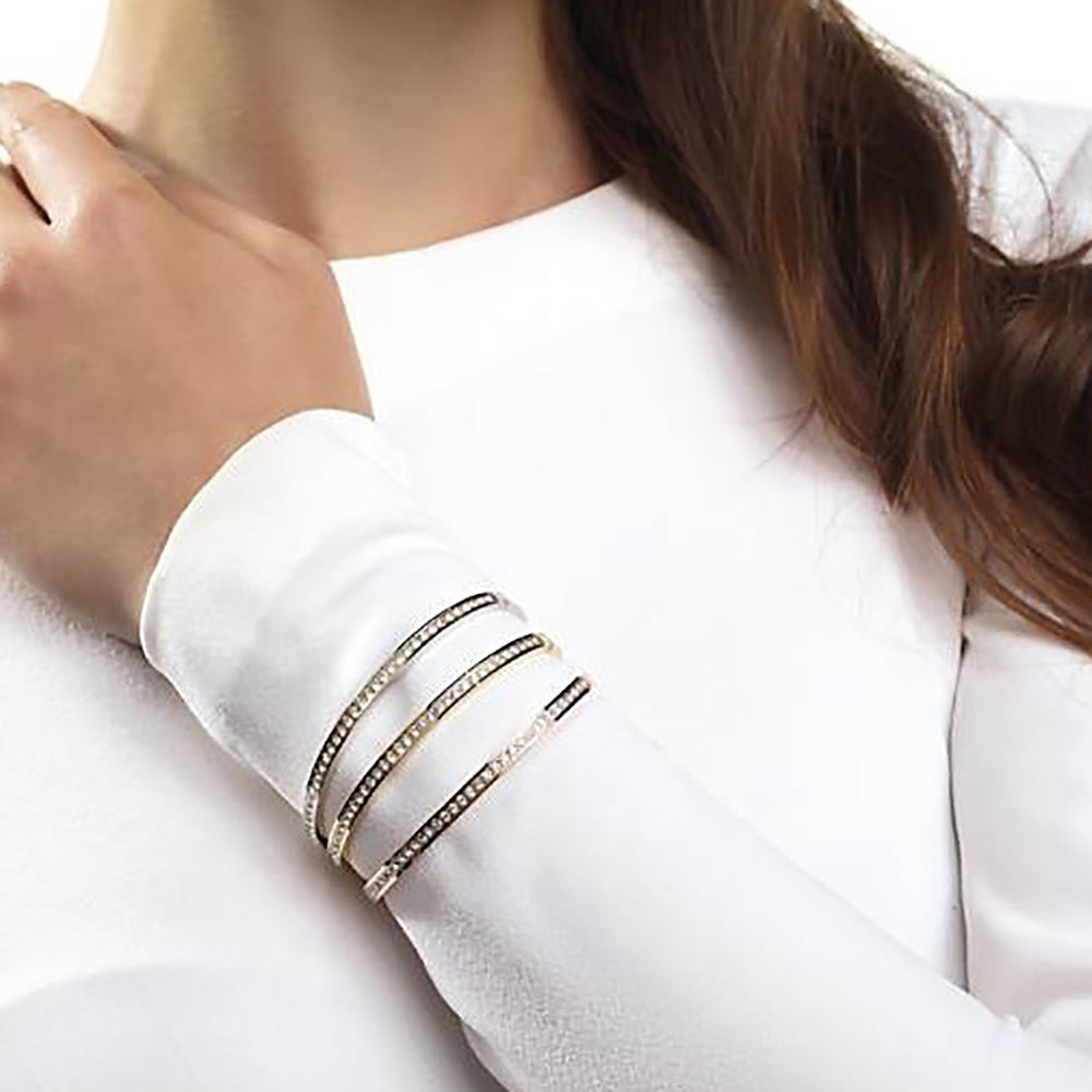 GUESS Gold - Plated Glistening Crystal Pave Fashion Bangle for Stylish Accessorizing