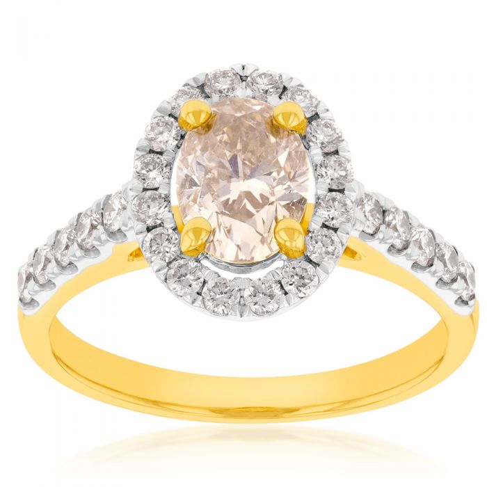 Exquisite 18 Carat Yellow Gold Ring Adorned with a 1.50 Carat Diamond Ensemble Featuring a 1 Carat Oval-Shaped Australian Diamond