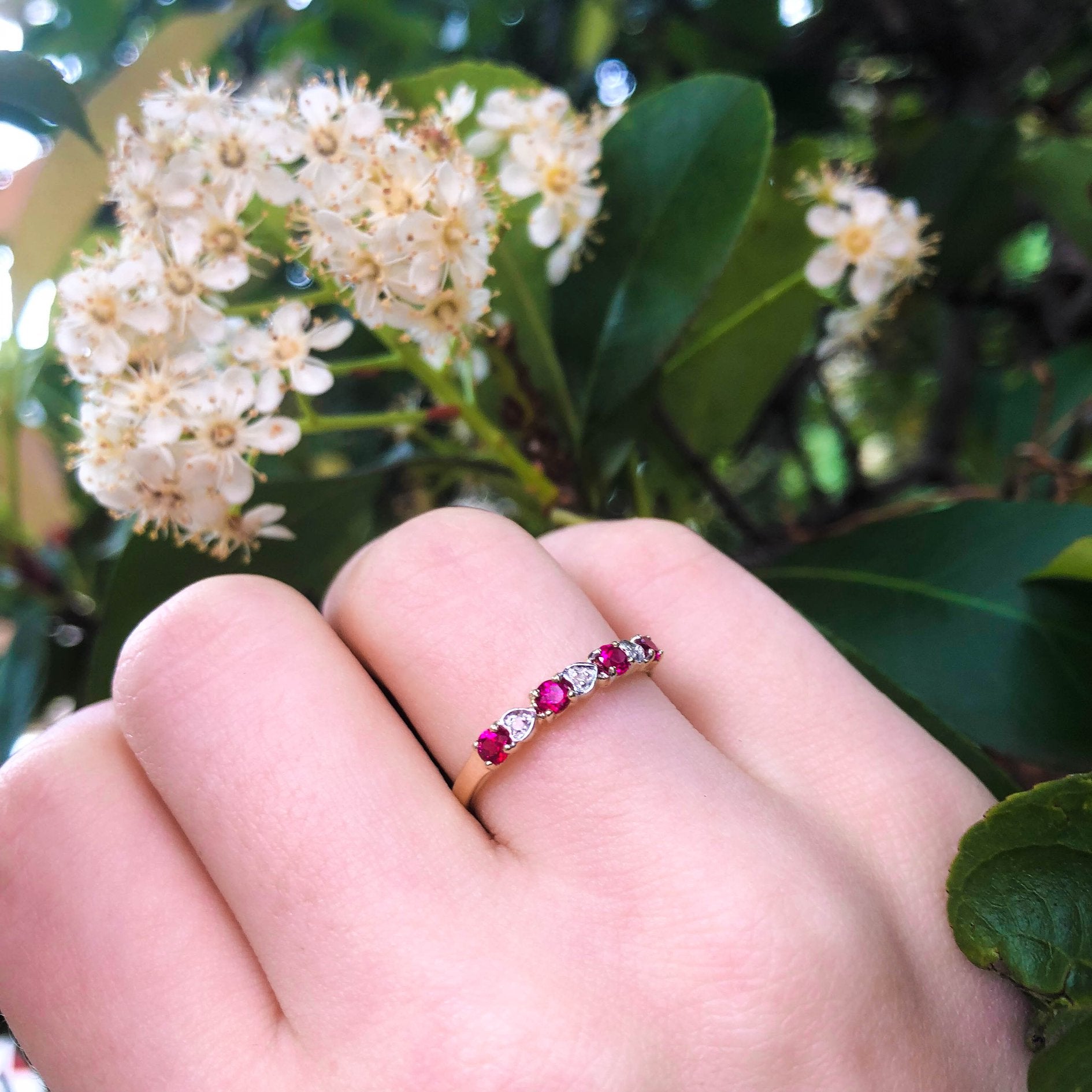 Exquisite 9ct Yellow Gold Ring Adorned with 4 Synthetic Rubies and 3 Diamonds