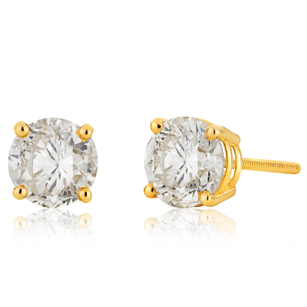 Exquisite 14 Carat Yellow Gold Stud Earrings Embellished with Approximately 1.5 Carats of Brilliant Diamonds