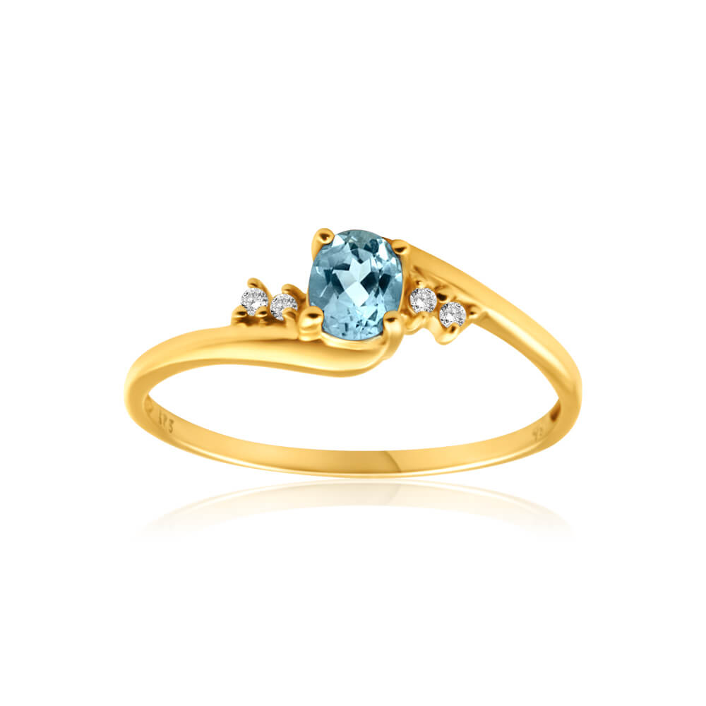 Exquisite 9 Carat Yellow Gold Ring with Blue Topaz and Four Cubic Zirconia Stones