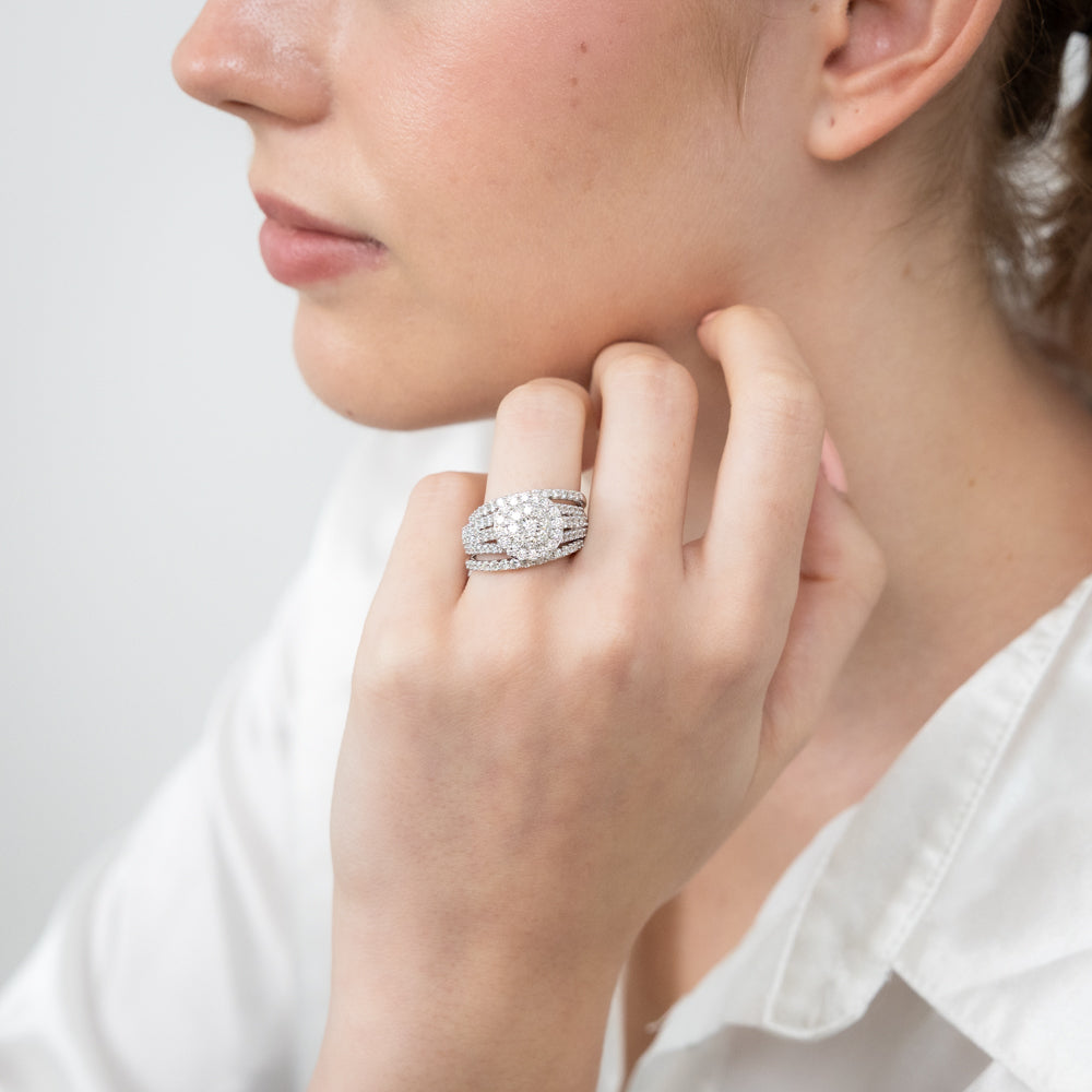 Exquisite 14 Carat White Gold 1.95 Carat Diamond Halo Bridal Three - Ring Set Featuring Brilliant - Cut Diamonds