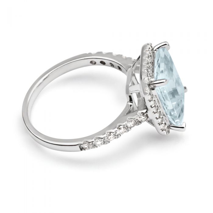 Stunning 9 Carat White Gold Ring Featuring 2.4 Carat Aquamarine and One - Third Carat Diamond