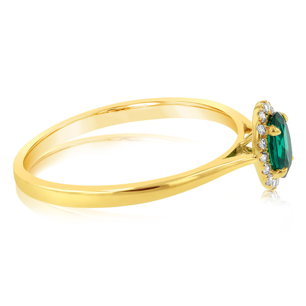 Exquisite 9ct Yellow Gold Ring with a Halo of Diamonds and a Created Oval Emerald