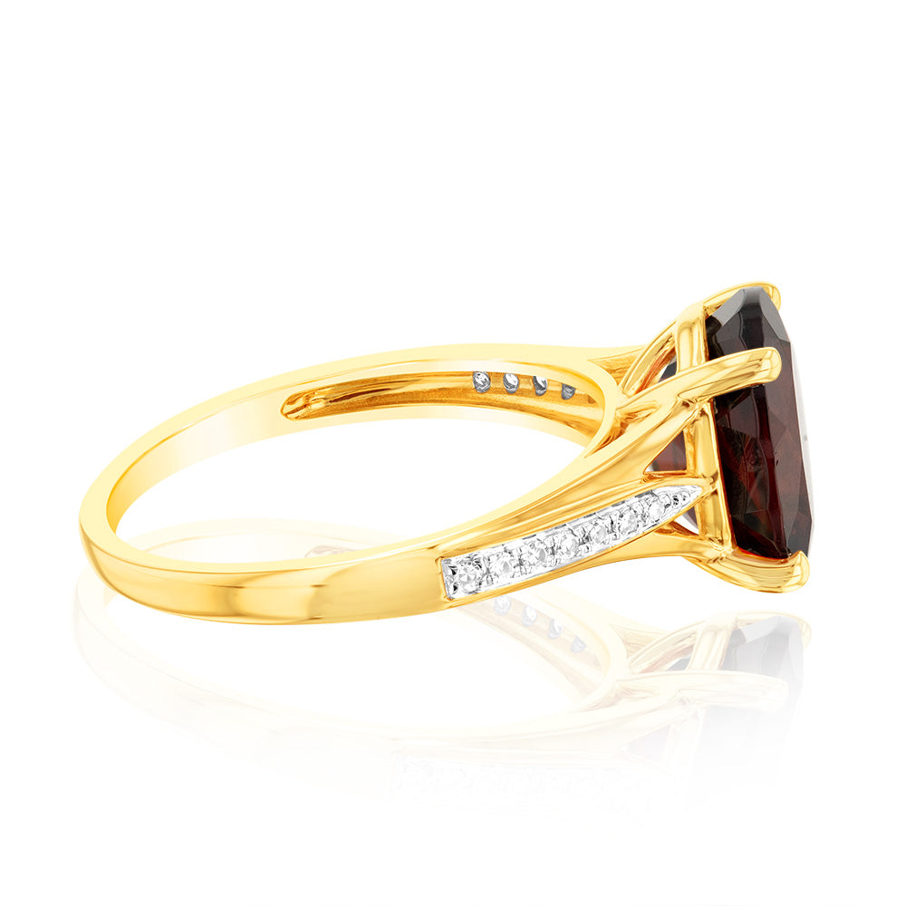Elegant 9ct Yellow Gold Dress Ring Featuring 3.10 Carat Garnet and 14 Sparkling Diamonds