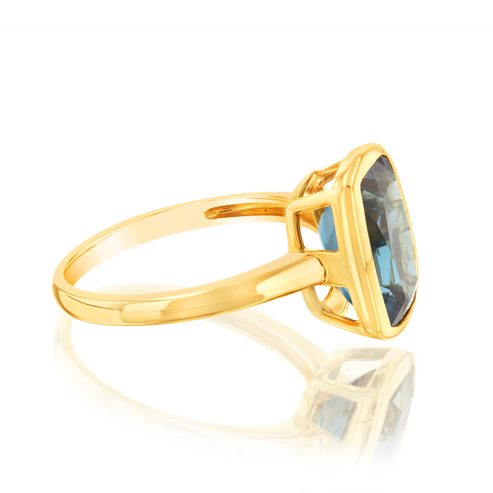 Exquisite 9 Carat Yellow Gold Ring with Naturally-Sourced London Blue Topaz in Bezel Setting