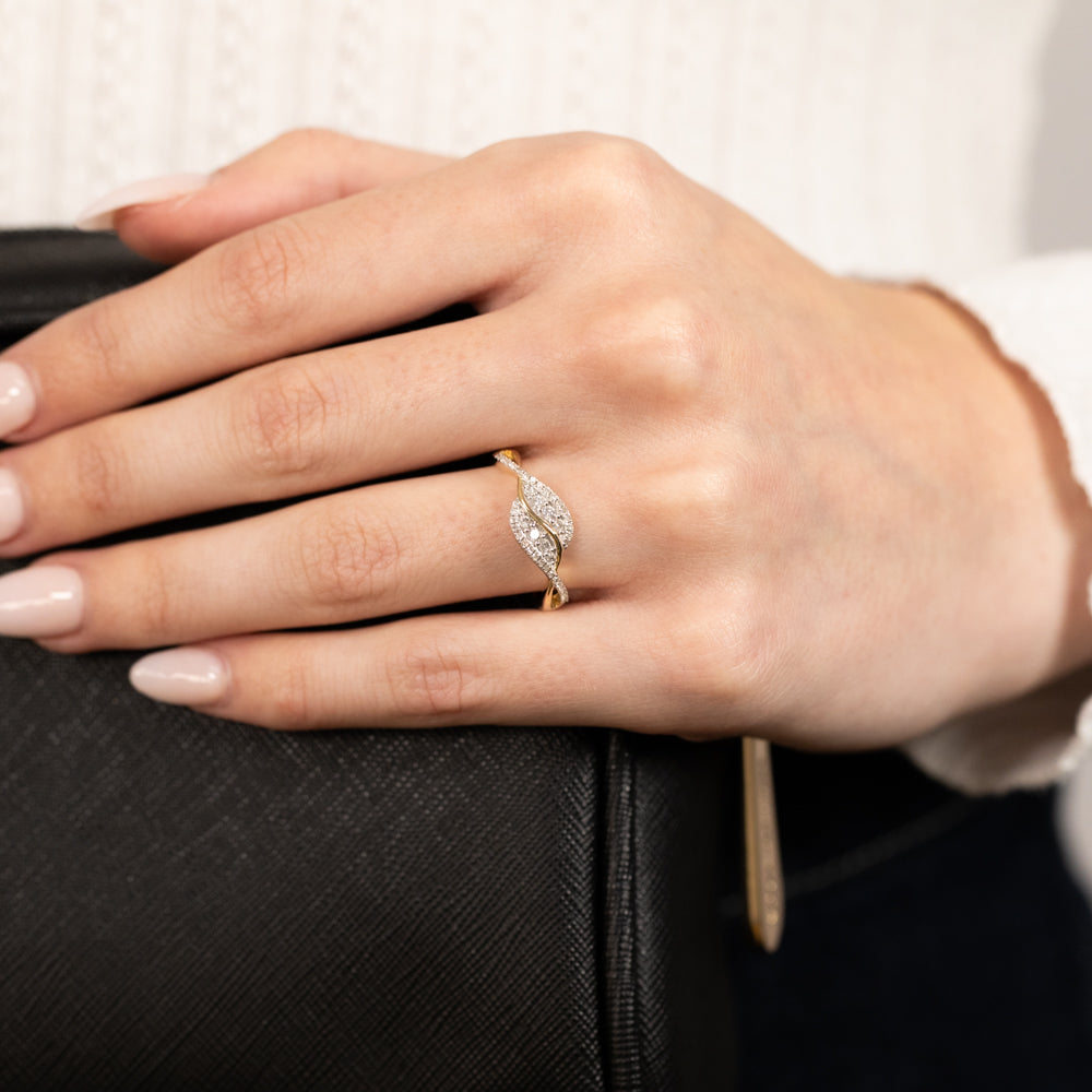 1/4 Carat Swirling Diamond Ring Crafted in 9ct Yellow Gold