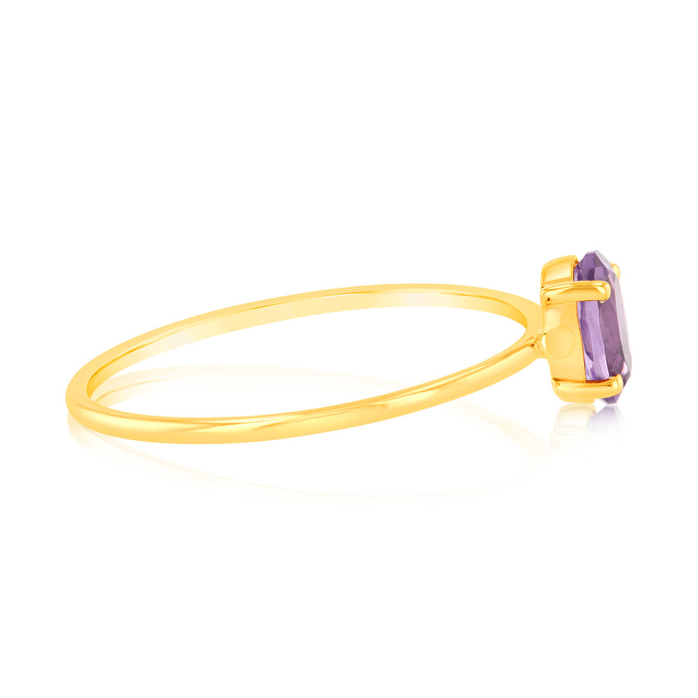 Exquisite 9 Carat Yellow Gold Ring Featuring a 6x4mm Oval 0.39 Carat Amethyst Gemstone