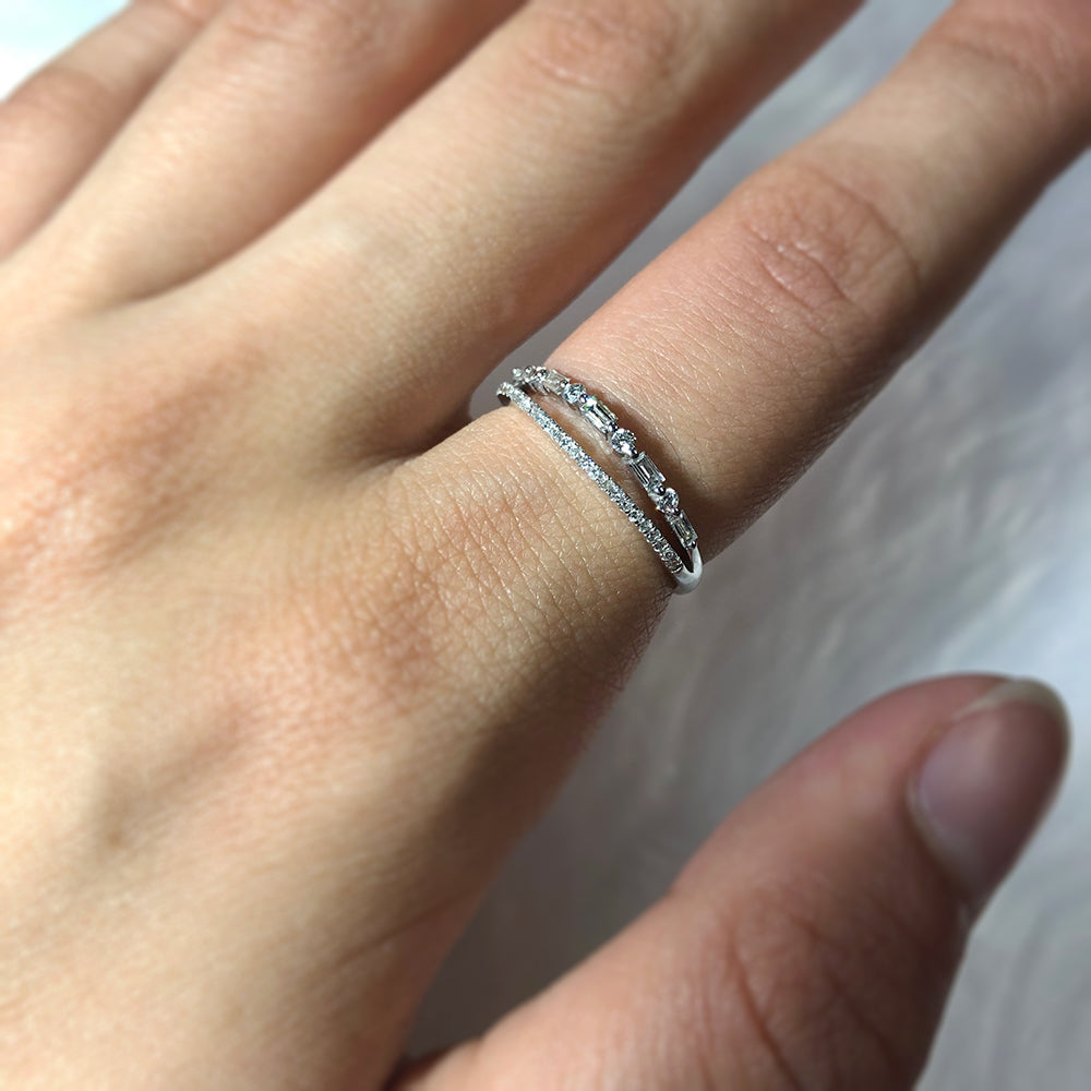 Exquisite 9ct White Gold Women's Ring Adorned with 1/4 Carat of Sparkling Brilliant and Baguette Cut Diamonds