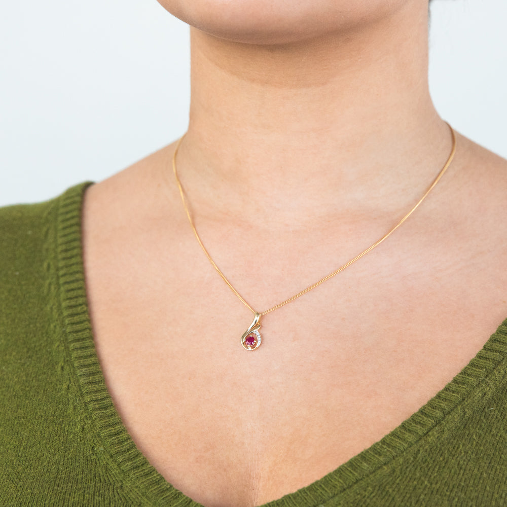 Stunning 9ct Yellow Gold Pendant with Natural Ruby and Diamond Swirl Design