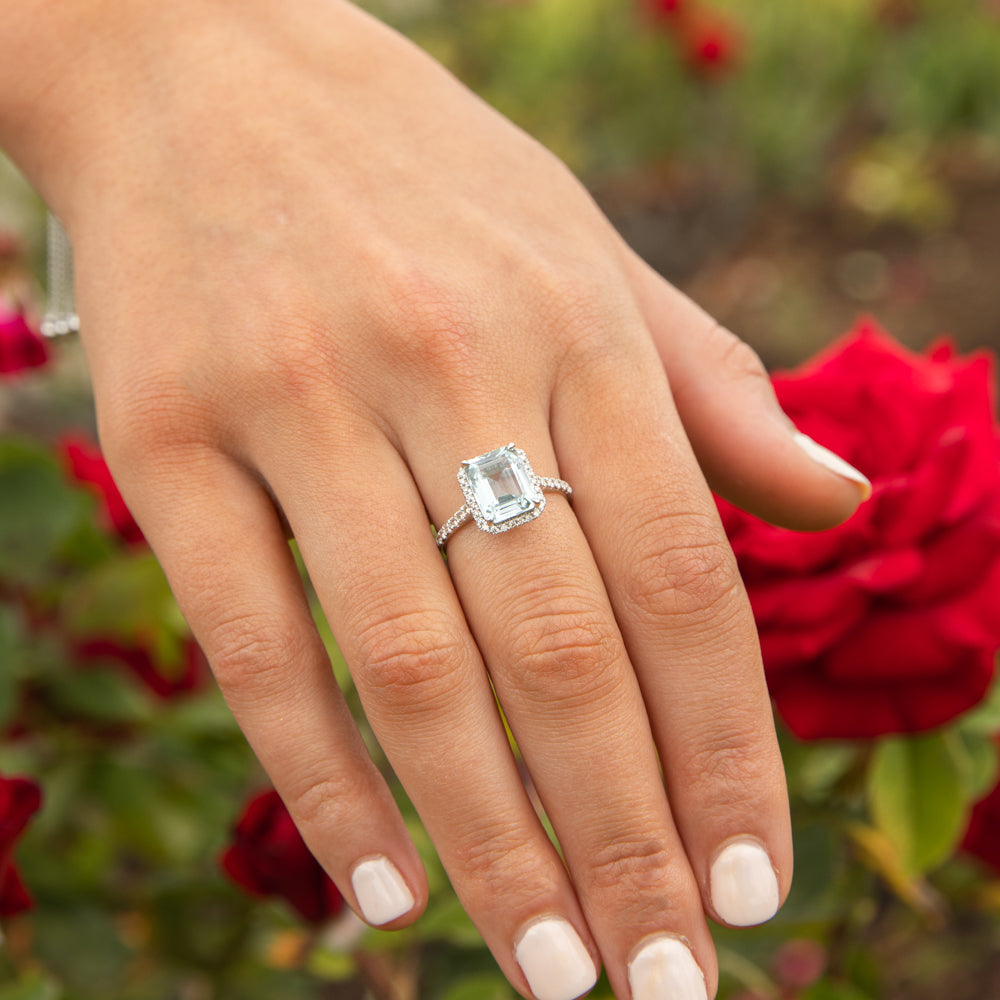 Stunning 9 Carat White Gold Ring Featuring 2.4 Carat Aquamarine and One - Third Carat Diamond