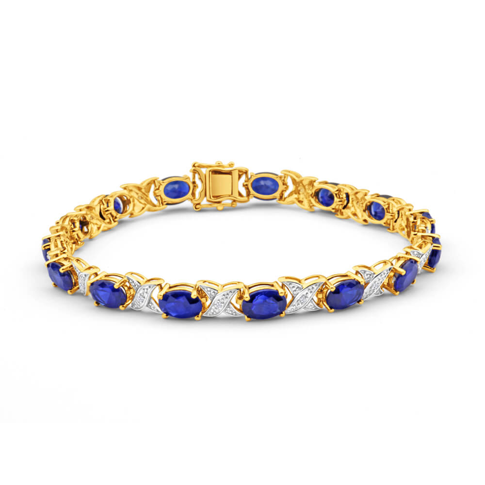 19cm 9ct Yellow Gold Crossover Bracelet with 7x5mm Oval Cut Lab-Created Sapphires and Diamonds