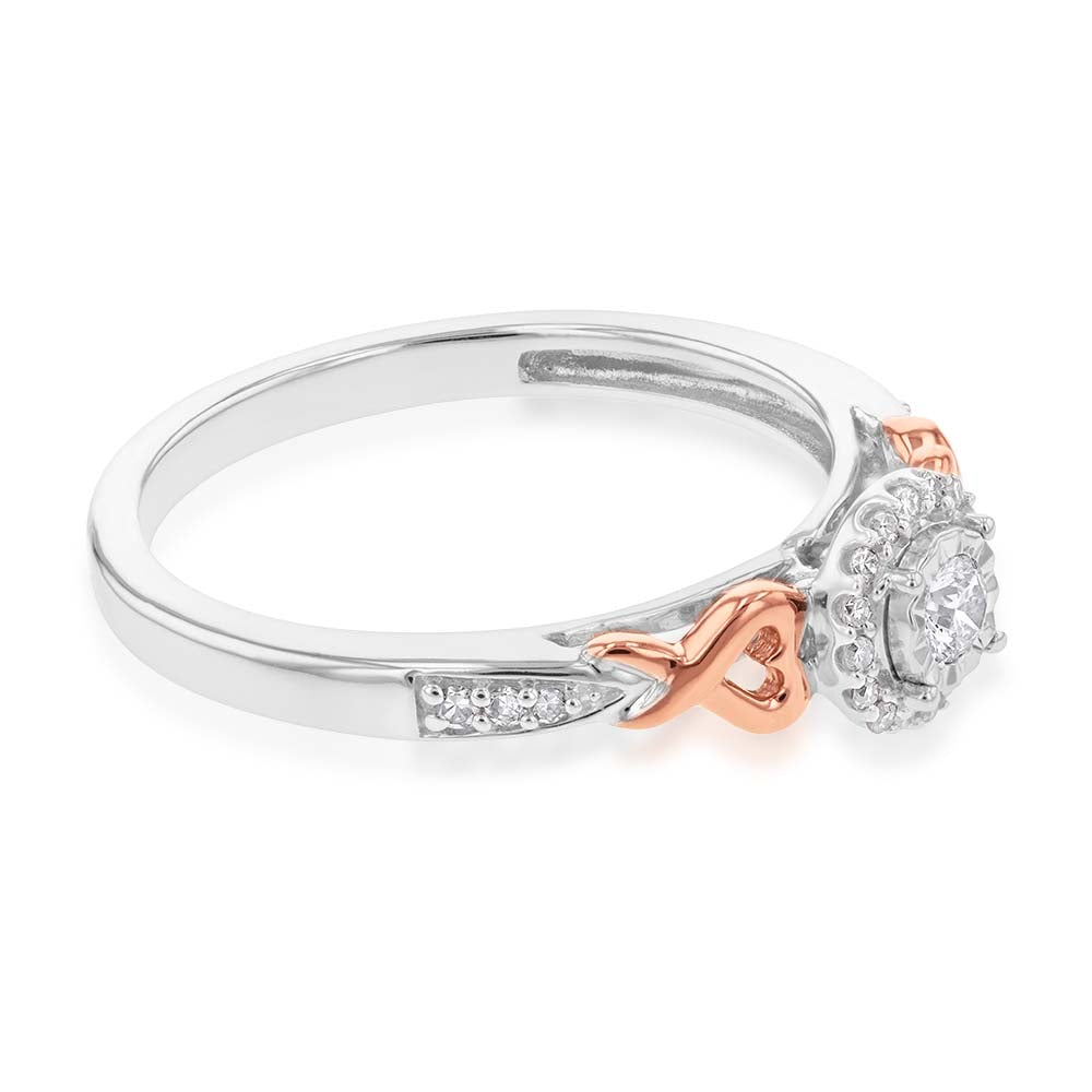 Exquisite 10 Carat White Gold Engagement Ring Adorned with Natural Enhanced Pink Sapphires and Rose Gold Heart Detailing on the Band