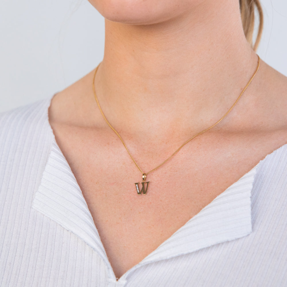 9 Carat Yellow Gold Initial W Pendant Embellished with Zirconia Stones - A Stunning Jewelry Piece