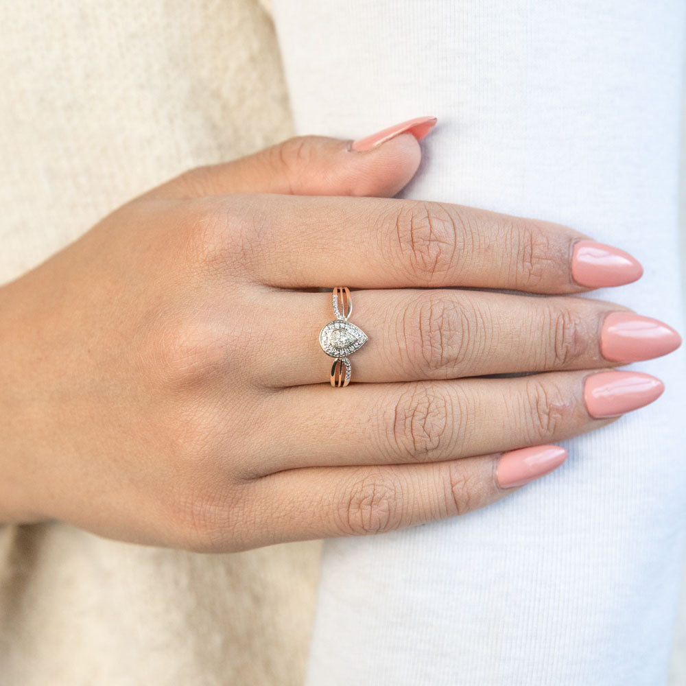 Exquisite 9ct Yellow Gold Ring with 13 Diamonds in Pear Shape