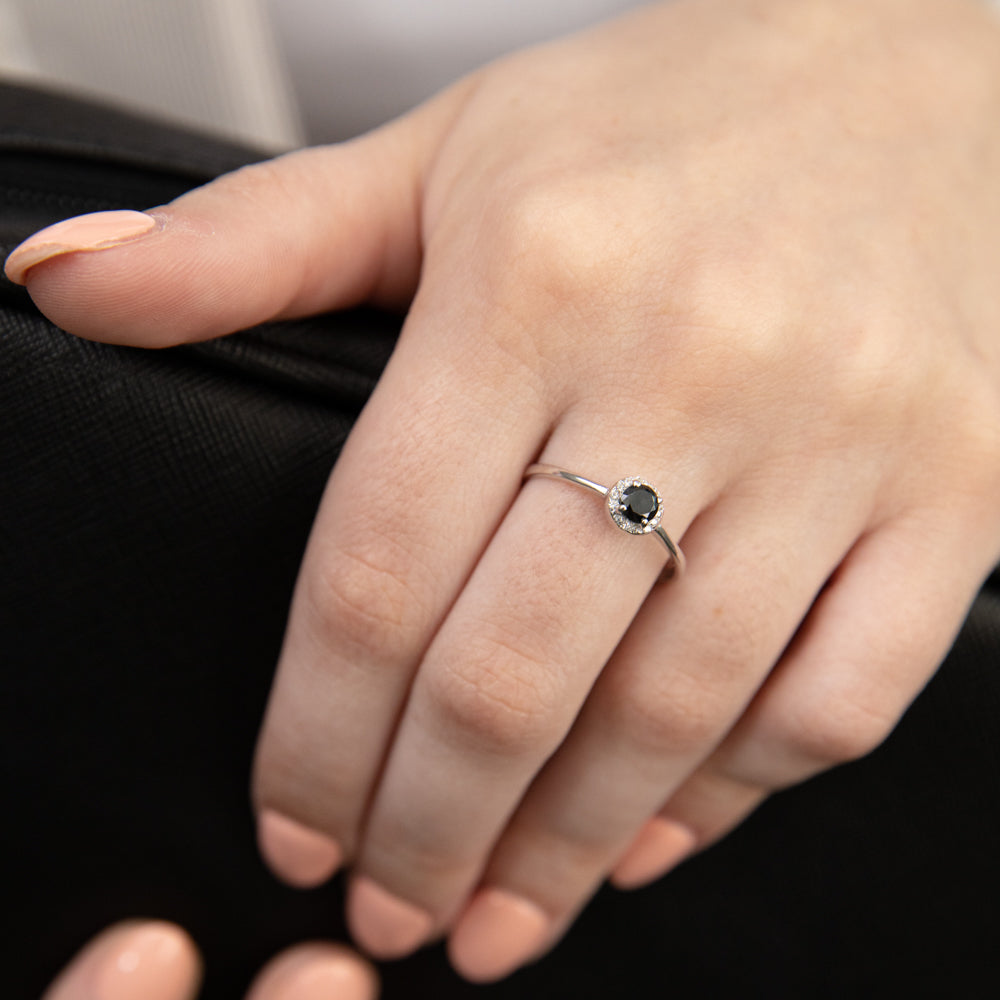 Stunning 9 Carat White Gold Halo Ring Featuring Black Zirconia Stones