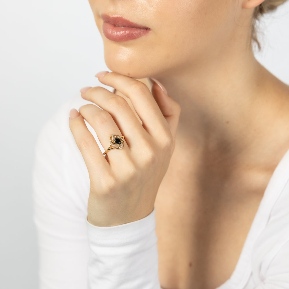 Exquisite 9 Carat Yellow Gold Ring Featuring a 0.65 Carat Natural Sapphire and 12 Sparkling Diamonds
