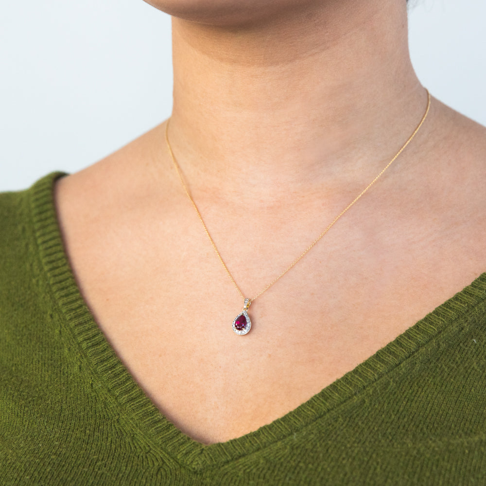 45cm Chain 9ct Yellow Gold Pendant with 0.15 Carat Diamond and 7x5mm Created Ruby Pear Halo