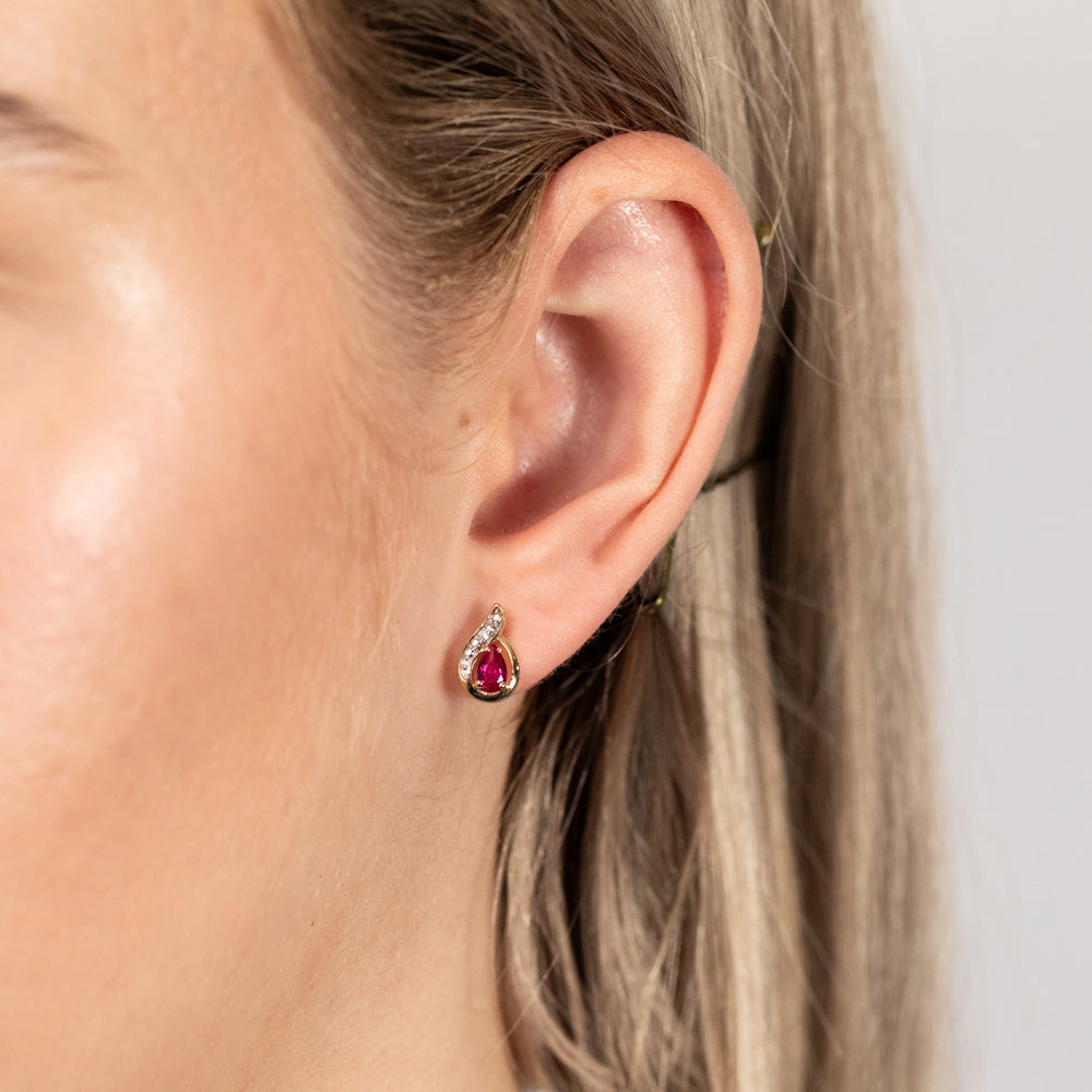 Gorgeous 9ct Yellow Gold Stud Earrings with 3x5mm Created Rubies