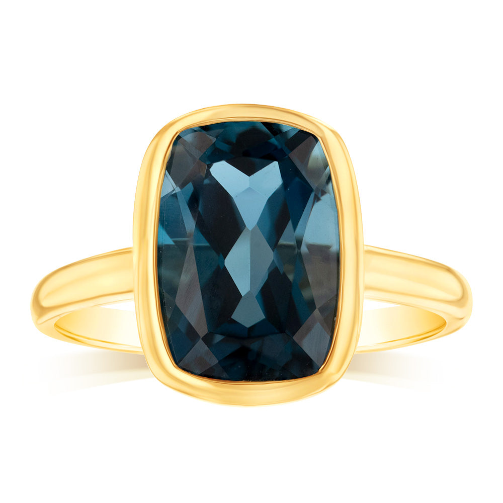 Exquisite 9 Carat Yellow Gold Ring with Naturally-Sourced London Blue Topaz in Bezel Setting