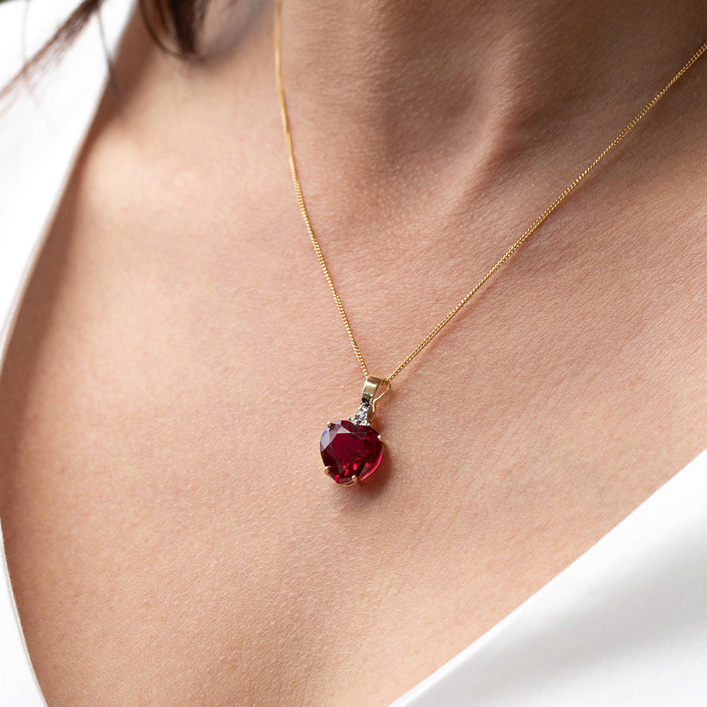 9ct Yellow Gold Pendant with Created Ruby Heart and Diamond Enhancer - A Stunning Jewelry Piece