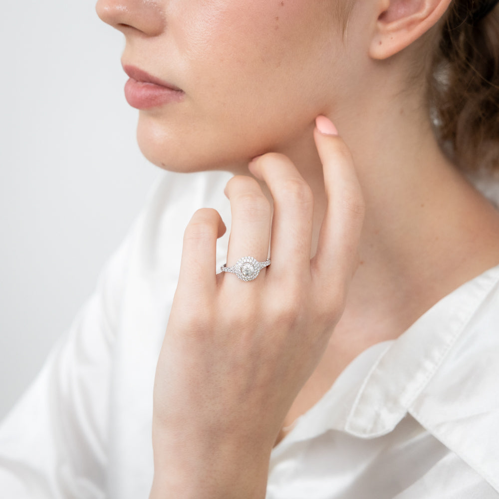 Exquisite 14 - carat White Gold Engagement Ring: 1 Carat Brilliant - cut Diamond Solitaire with Double Diamond Halo and Diamond - split Shank