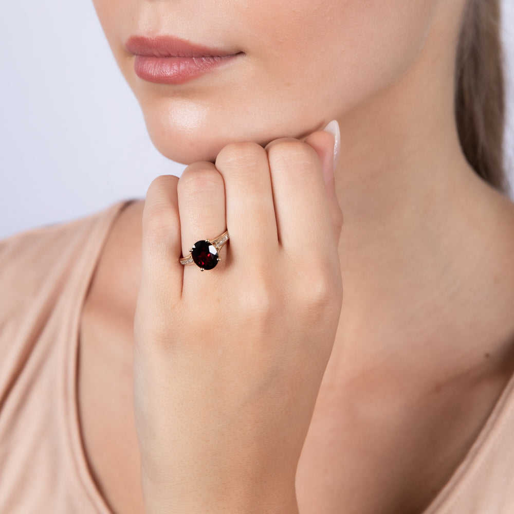 Elegant 9ct Yellow Gold Dress Ring Featuring 3.10 Carat Garnet and 14 Sparkling Diamonds