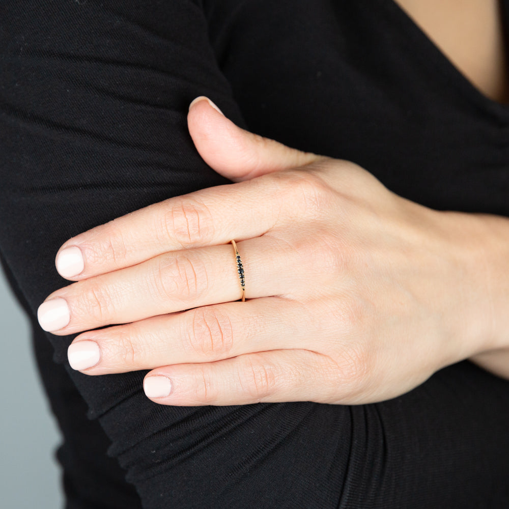 Stunning 9 Carat Yellow Gold Ring Featuring Graduating Natural Sapphires