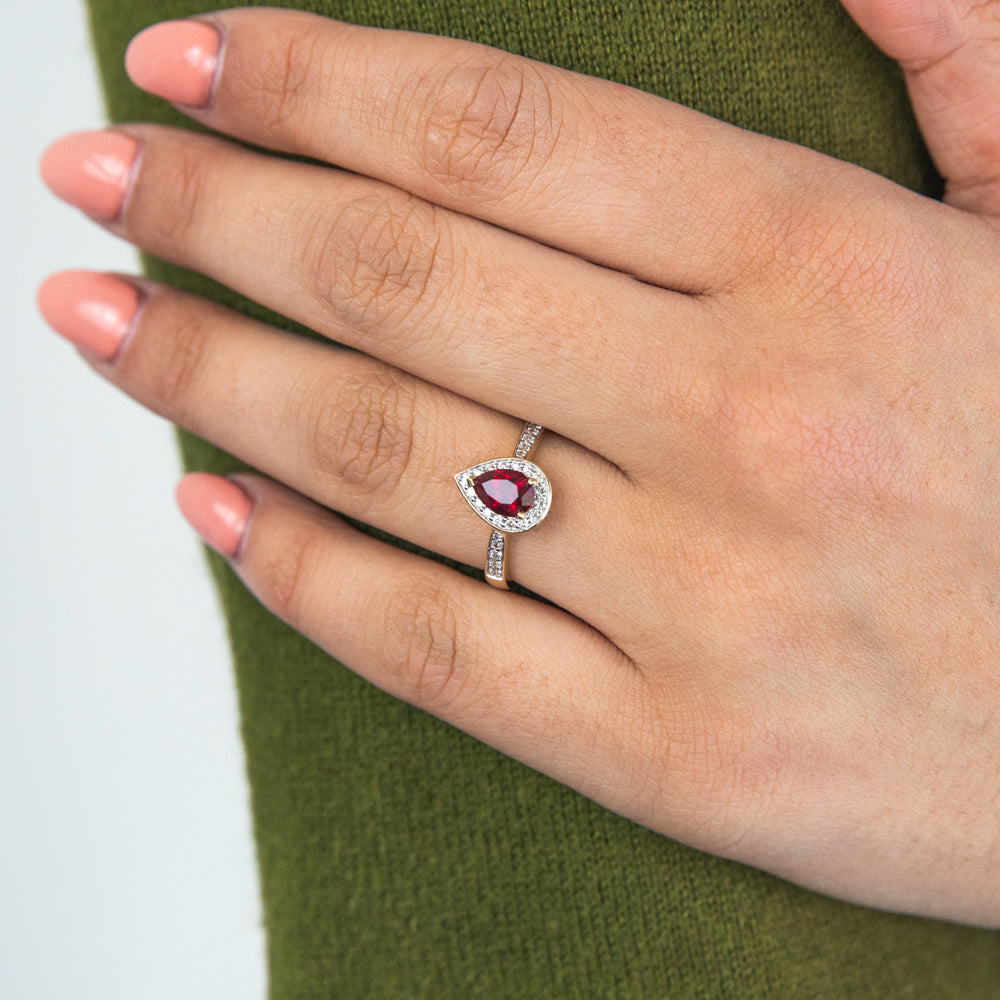 9ct Yellow Gold Ring with Created Ruby and 1/5 Carat Diamond in a Pear Halo Design