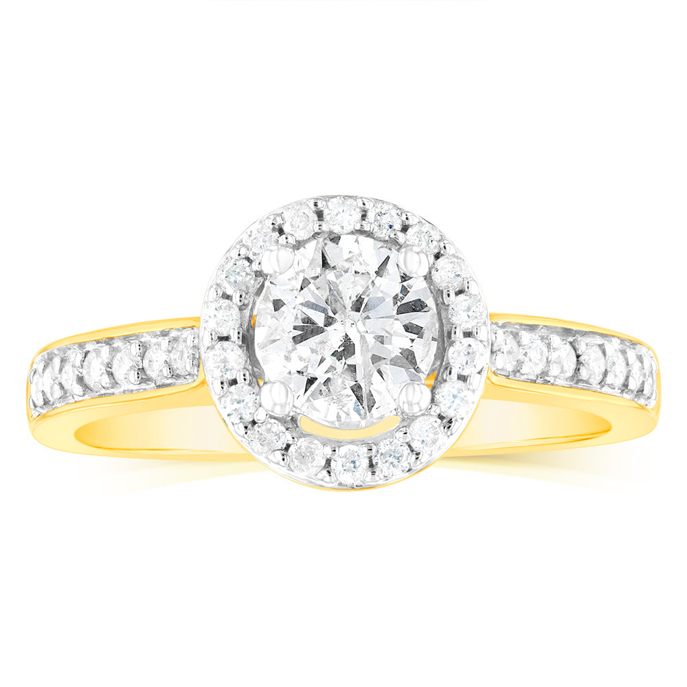 Exquisite 14 Carat Yellow Gold One-Carat Brilliant Cut Diamond Halo Solitaire Engagement Ring with Additional Diamonds on the Shank