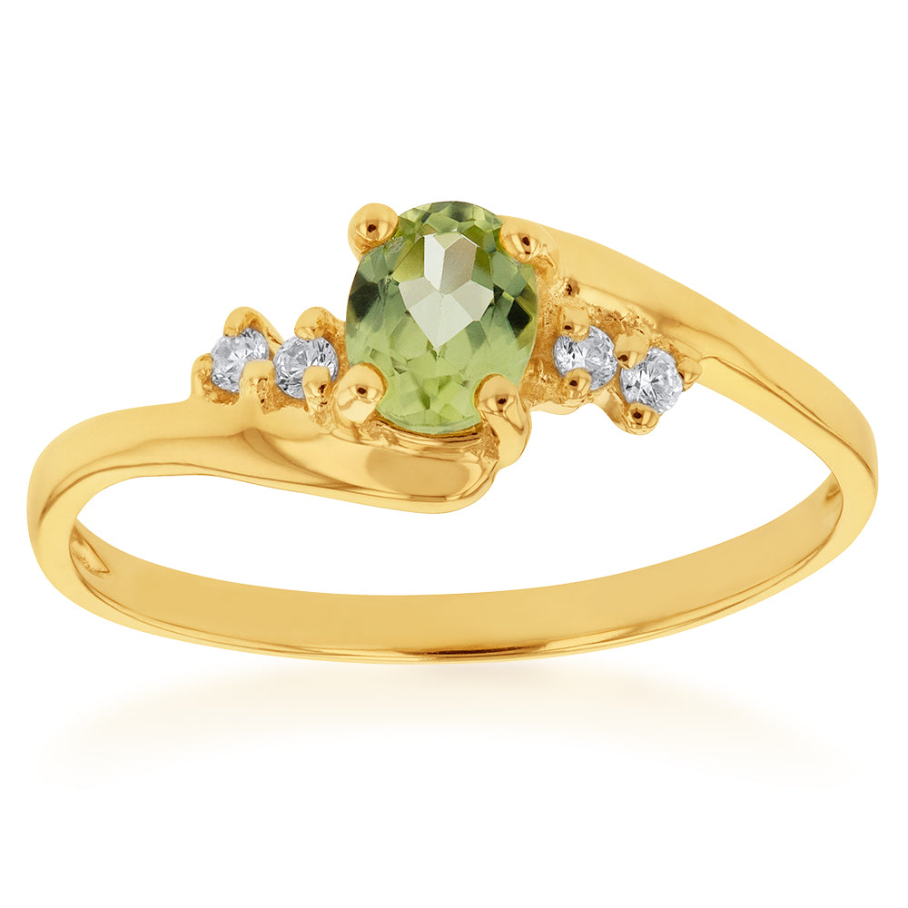 Stunning 9 Carat Yellow Gold Ring with Peridot and Zirconia Gemstones