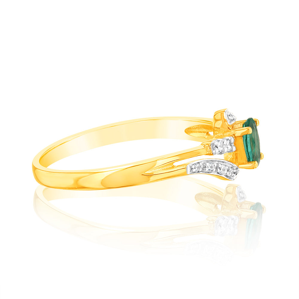 Exquisite 9 Carat Yellow Gold Ring Adorned with 0.26 Carat Created Emerald and 14 Cubic Zirconia Stones