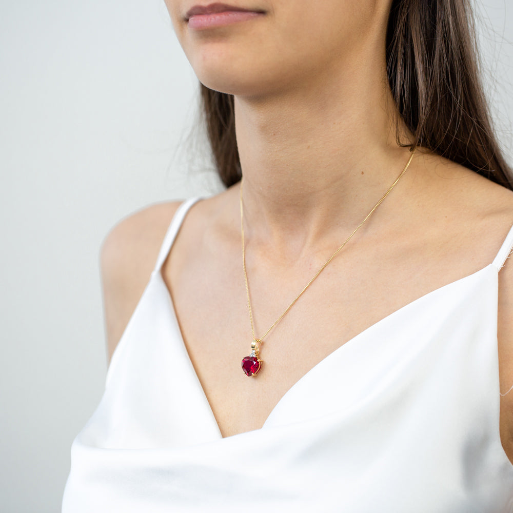 9ct Yellow Gold Pendant with Created Ruby Heart and Diamond Enhancer - A Stunning Jewelry Piece